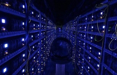A large-scale mining farm with rows of ASIC miners.