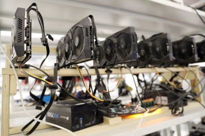 Modern cryptocurrency mining farm harnessing renewable energy for hosting miners